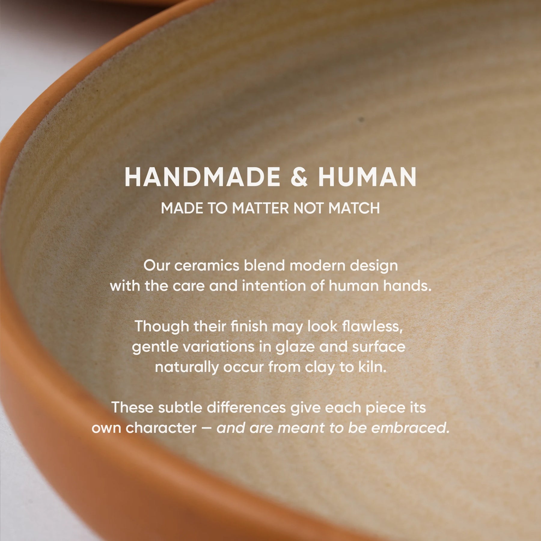 Close-up of a ceramic bowl with text about handmade ceramics.