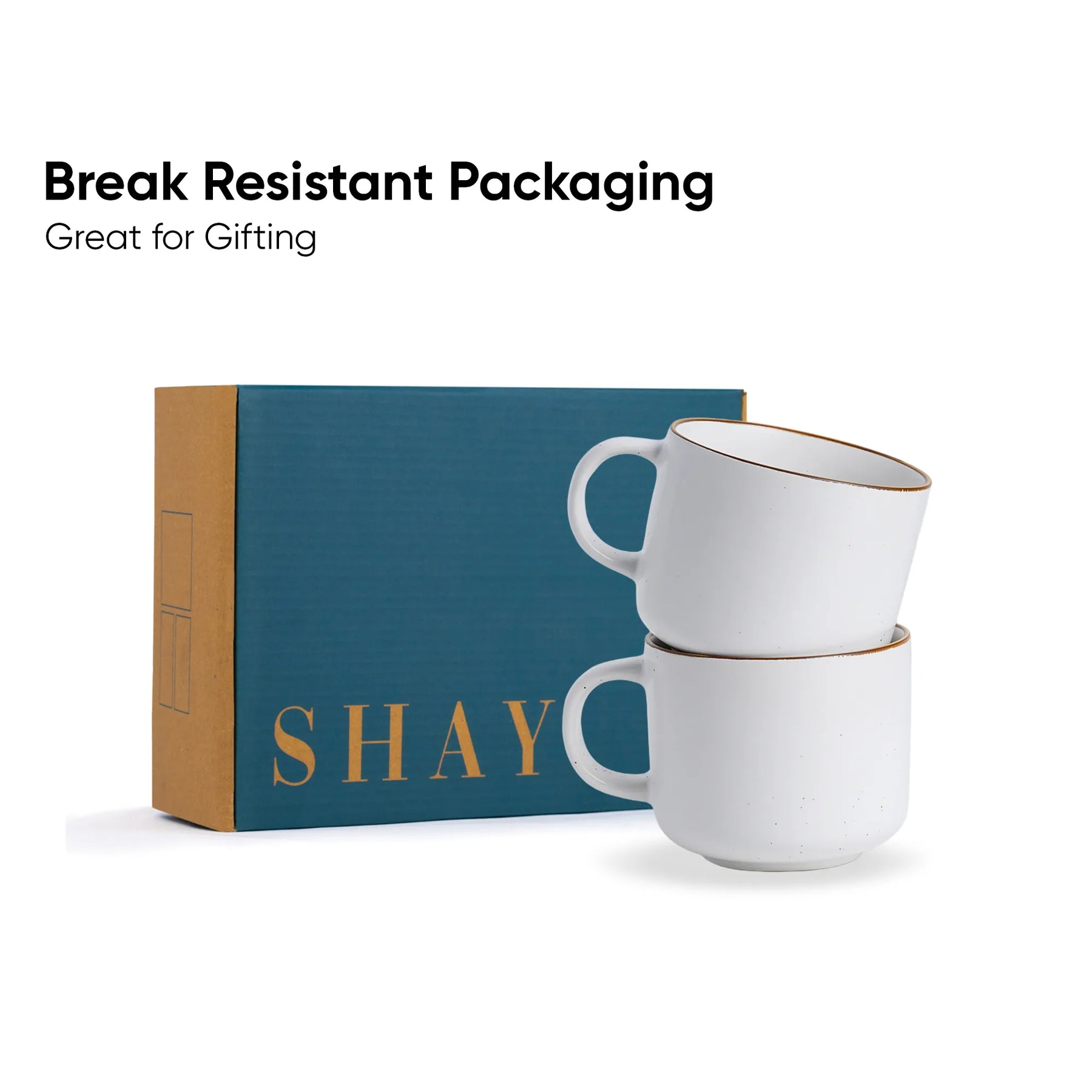 Two white mugs stacked on top of each other with a blue box labeled 'SHAY' in the background.