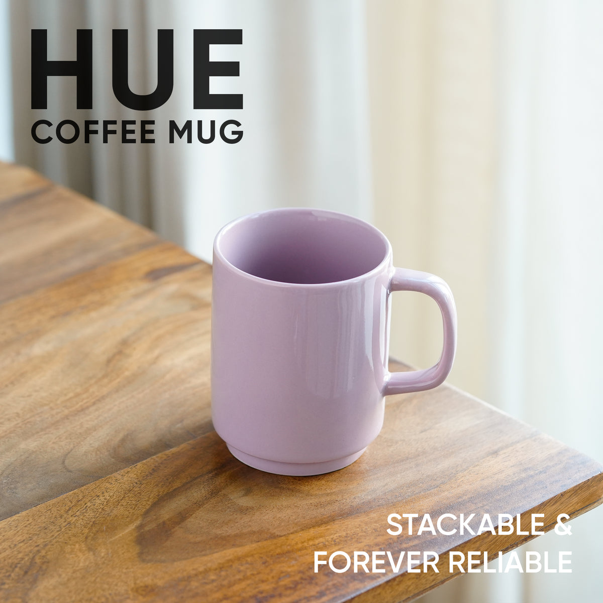 Purple coffee mug on a wooden surface with 'HUE' branding and text about stackability and reliability.