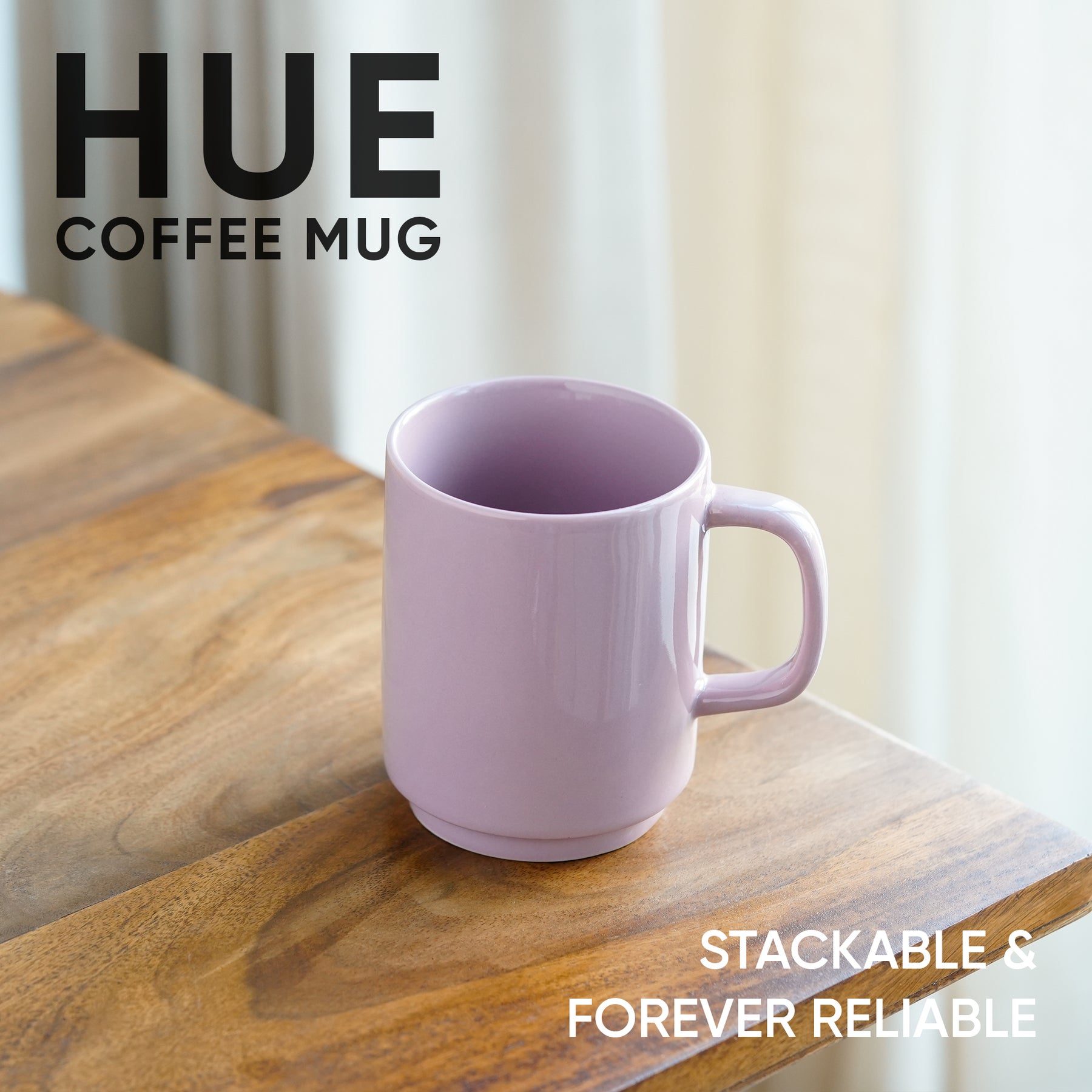 Purple coffee mug on a wooden surface with 'HUE' branding and text about stackability and reliability.