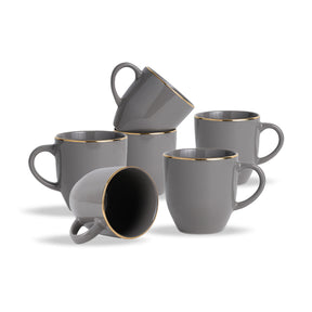 Set of gray mugs with gold rims on a white background