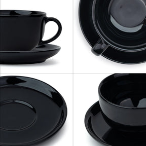 Black ceramic cup, saucer, and bowl set on a white background