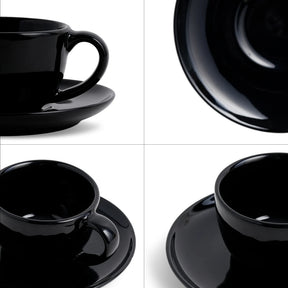Black ceramic tableware set including cups and saucers on a white background