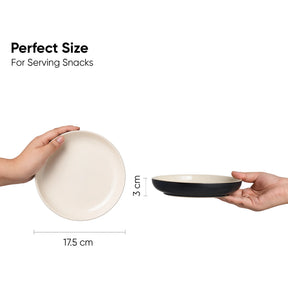 Two hands holding a white and a black plate with measurements on a white background.