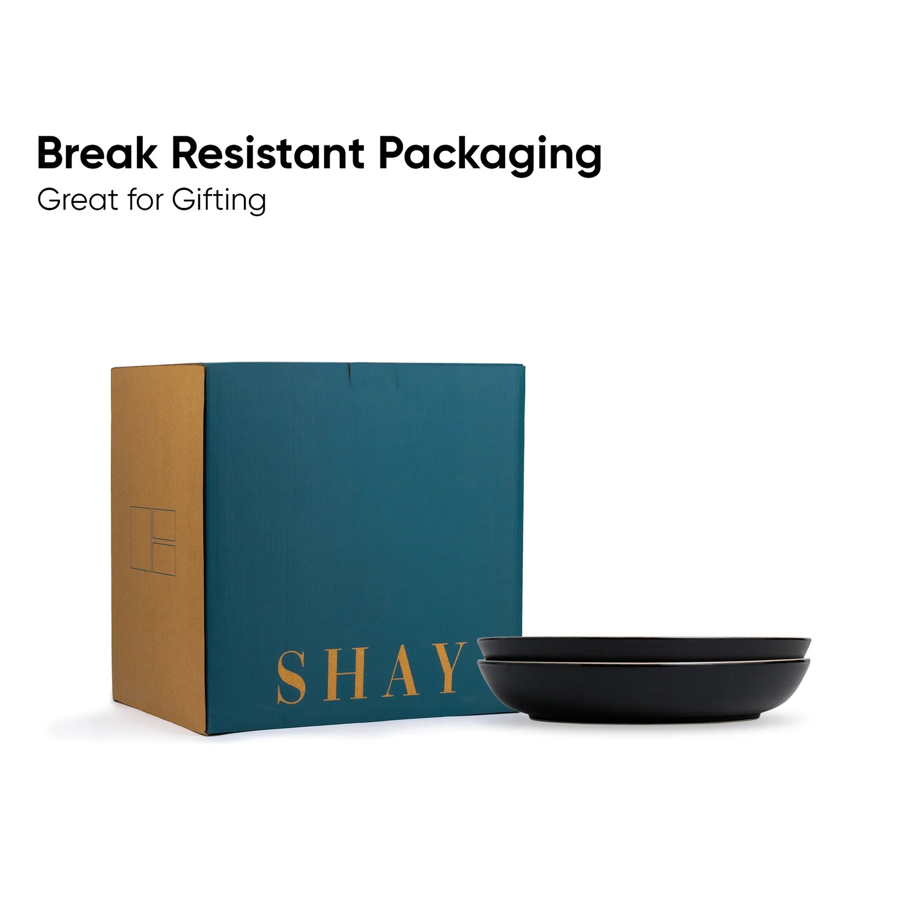 Black bowl and teal box with 'SHAY' branding on a white background, labeled as break-resistant packaging.