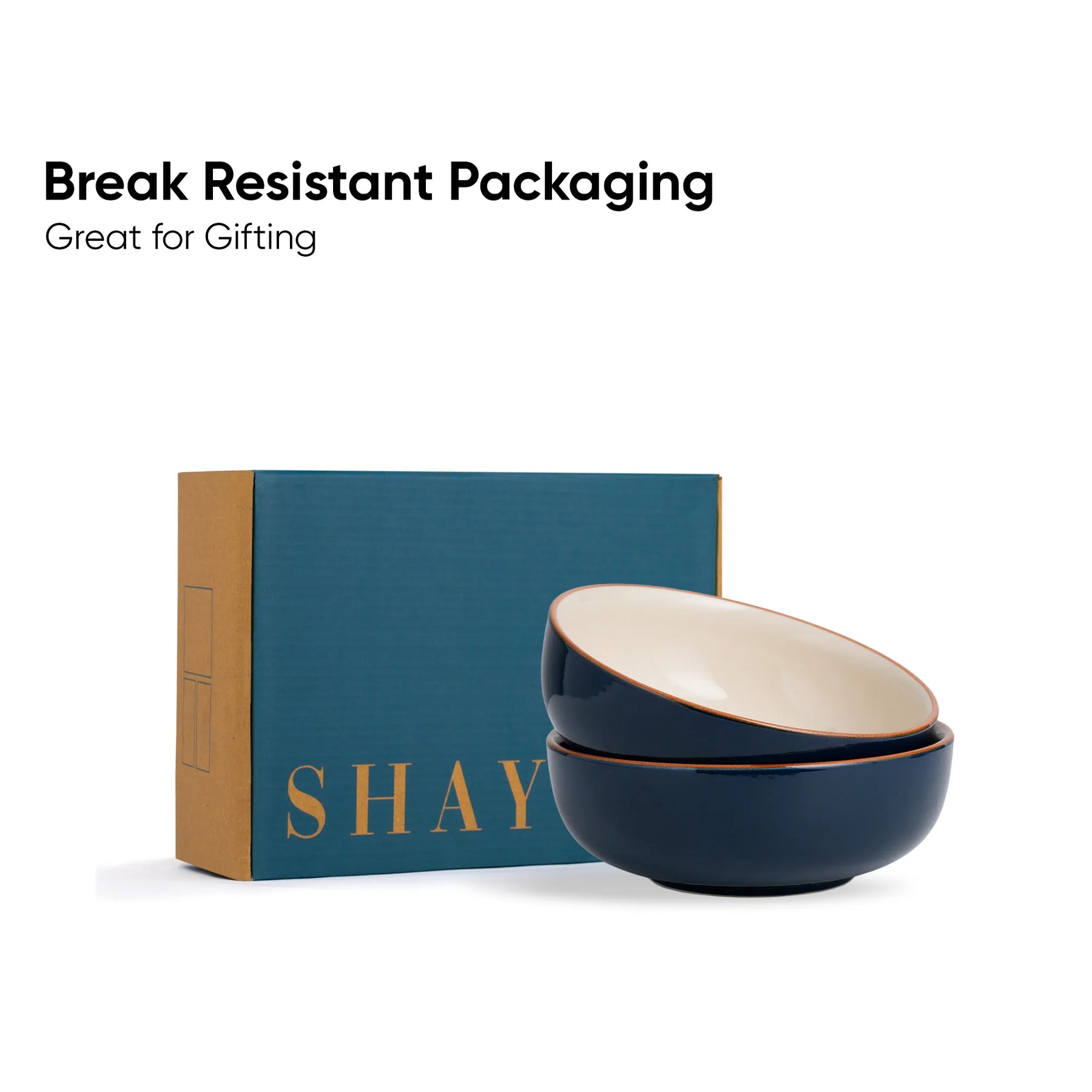 Two navy blue bowls with gold rims and a 'SHAY' branded box on a white background.