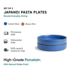 Set of 2 Japandi pasta plates with cobalt blue color and brown rim on a white background.
