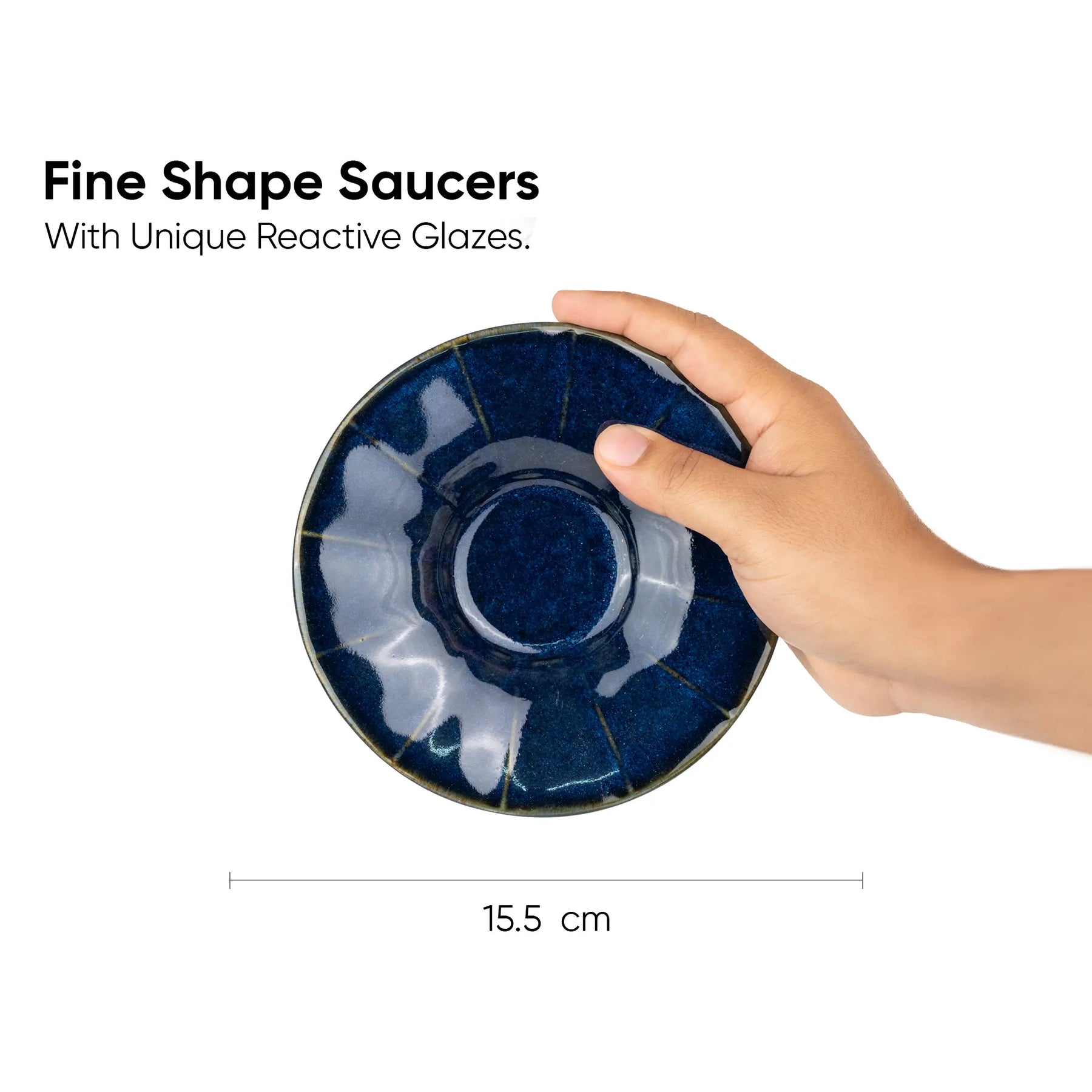 Hand holding a blue ceramic saucer with text about unique reactive glazes.