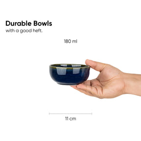 Blue ceramic bowl held in a hand with text indicating size and durability.