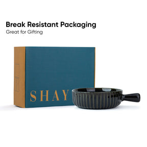 Black ceramic bowl with 'SHAY' branded box on a white background
