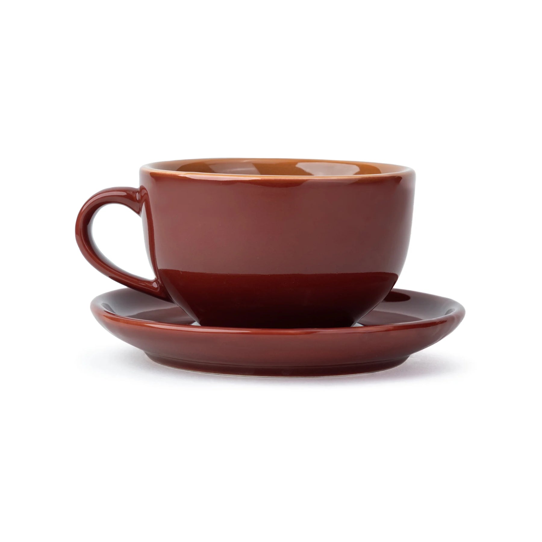 Brown ceramic cup and saucer set on a white background