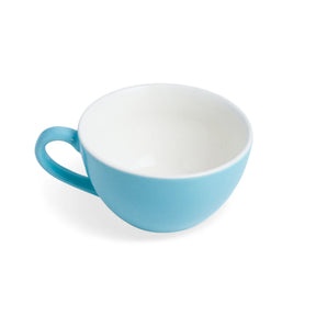 Blue and white ceramic cup on a white background