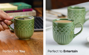 Green ceramic mug with decorative patterns held by a hand and placed on a surface.