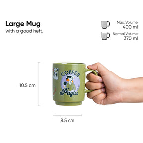 Green mug with 'Coffee Paglu' design held by a hand, showing measurements and volume details.
