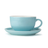 Light blue cup and saucer set on a white background