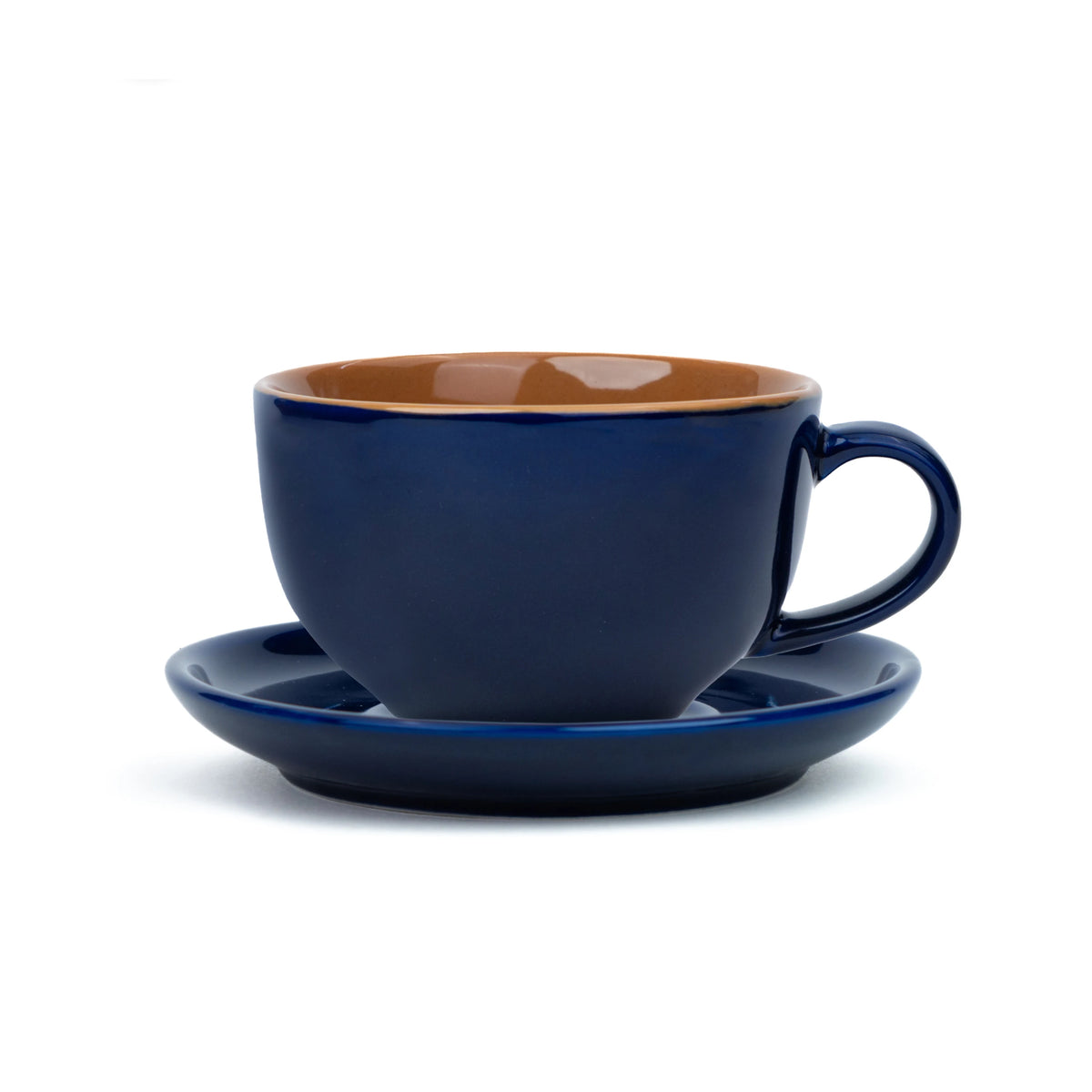 Blue ceramic cup and saucer set on a white background