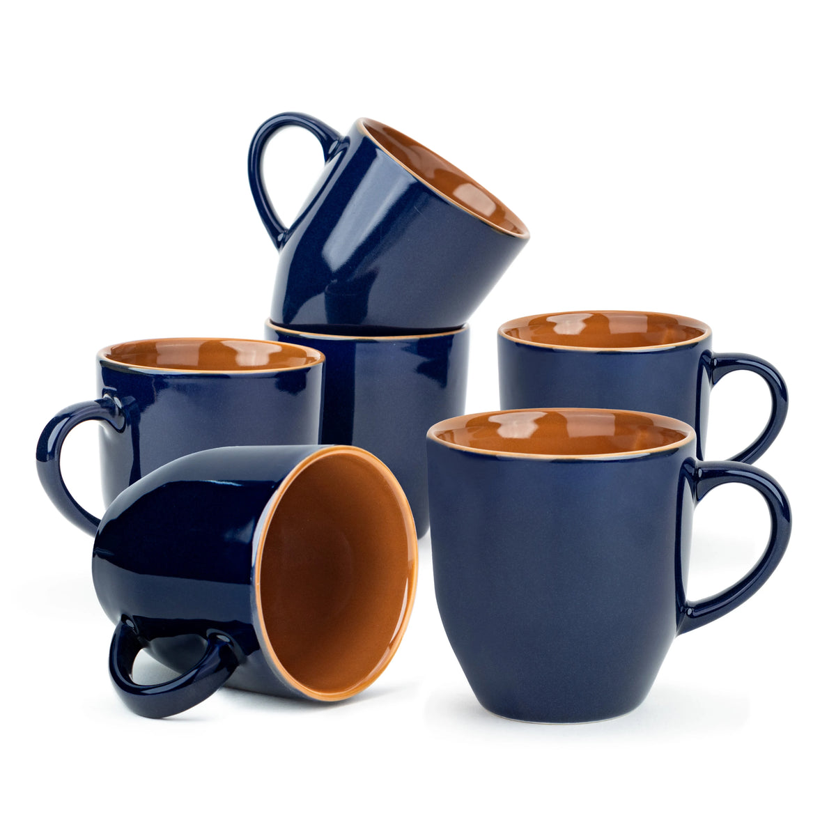 Set of blue mugs with brown interior on a white background