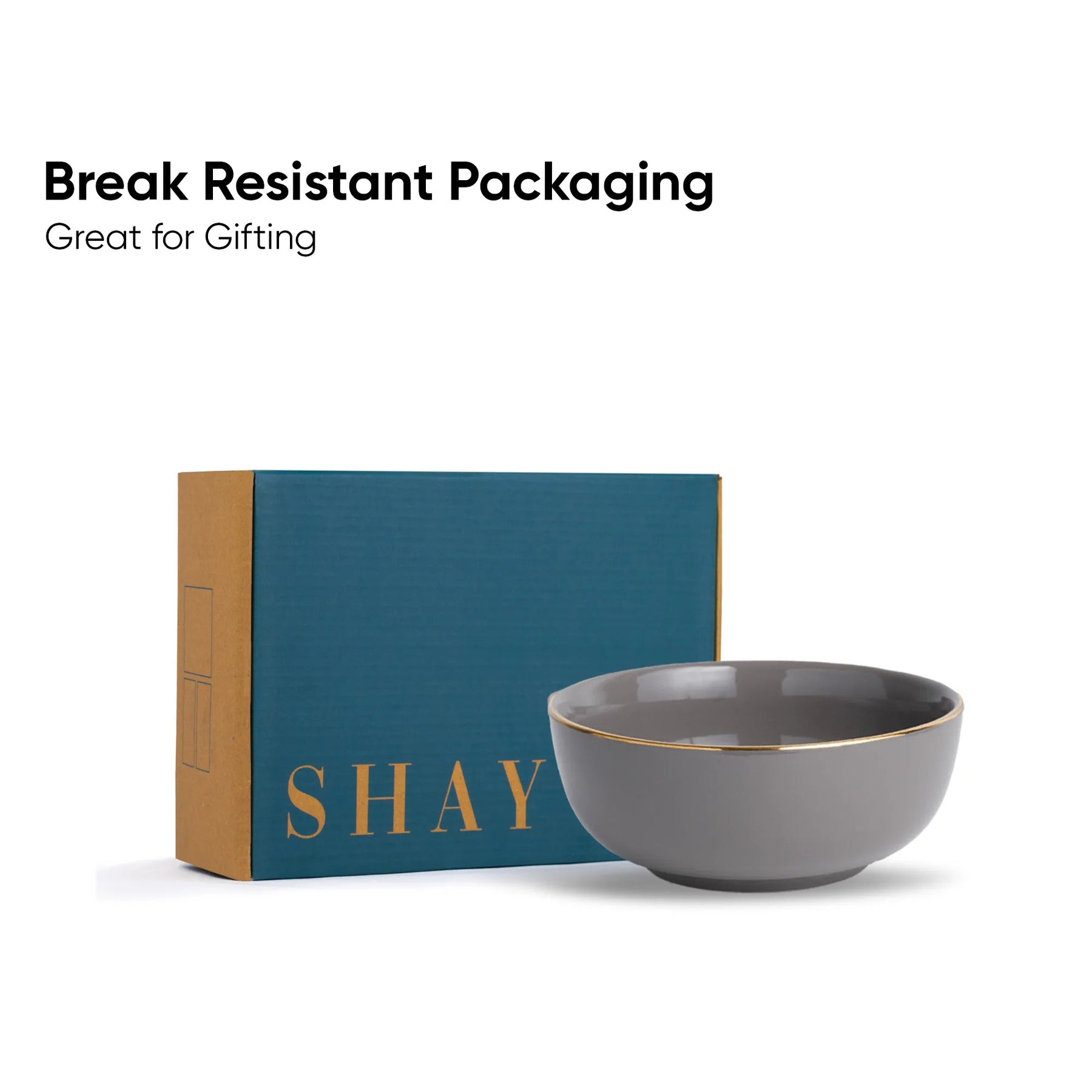 Gray bowl with 'SHAY' branding next to a teal box on a white background