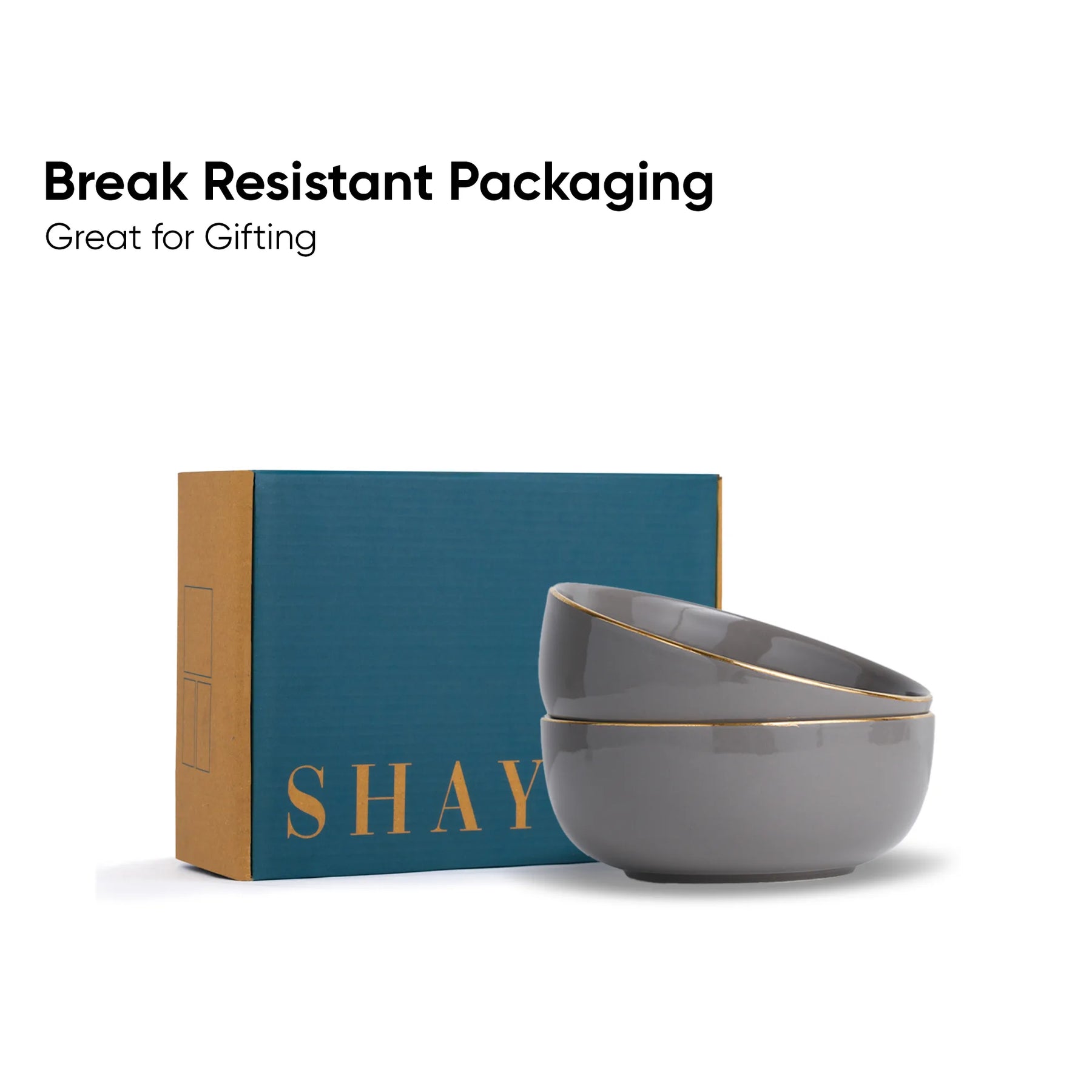 Gray bowls with gold rims on a blue 'SHAY' branded box, with text about break-resistant packaging.