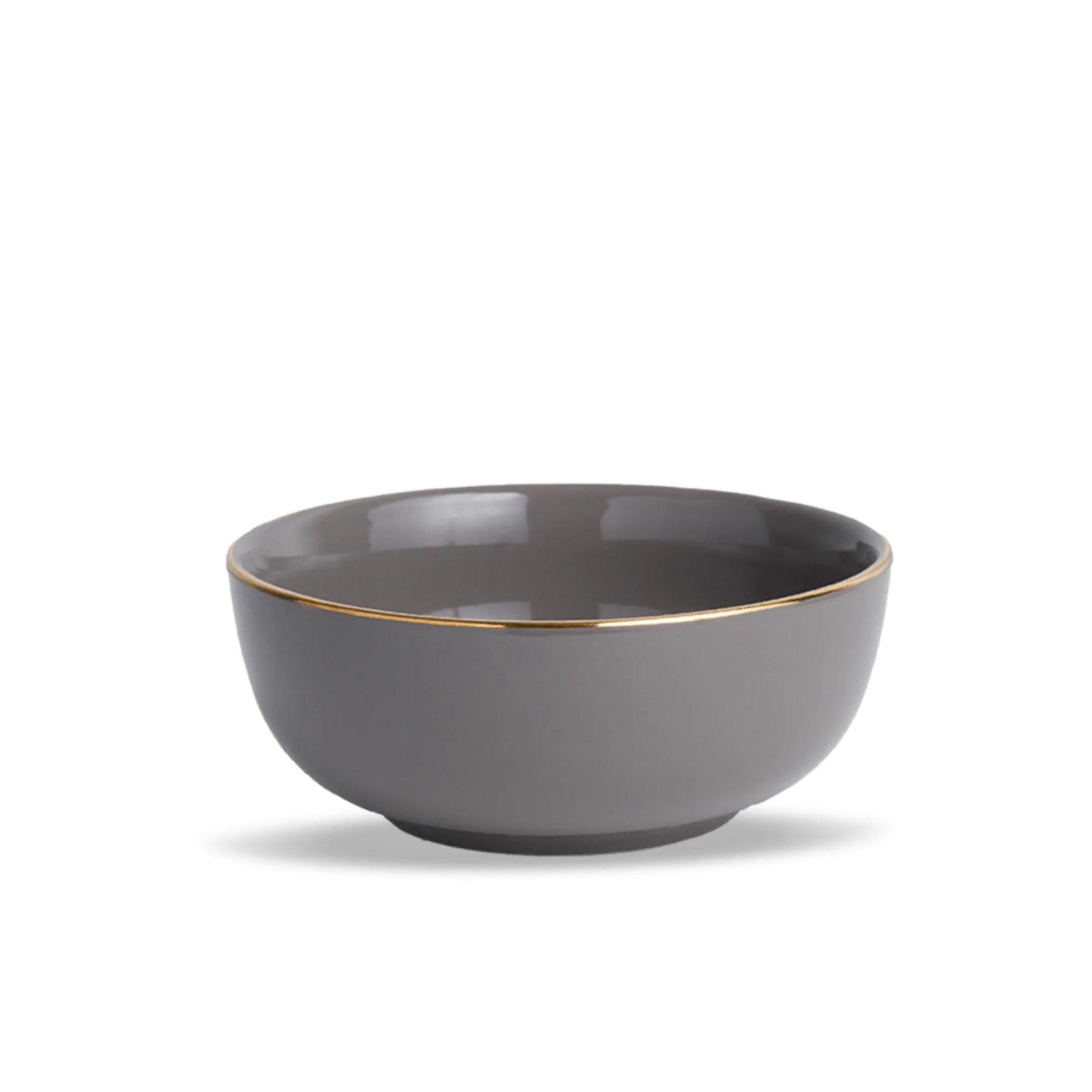 Gray ceramic bowl with gold rim on a white background
