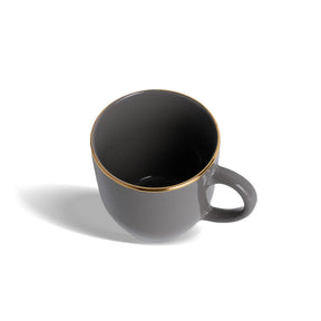 Gray mug with gold rim on a white background