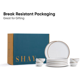 Ceramic dinnerware set with 'SHAY' branding and break-resistant packaging on a white background.