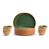 Set of green and brown ceramic dishes on a white background