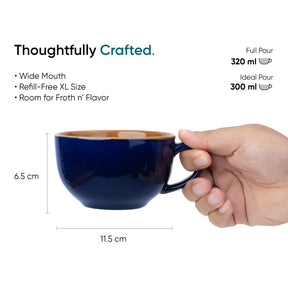 Blue mug with wooden interior held by a hand, showing measurements and text about the mug's features.
