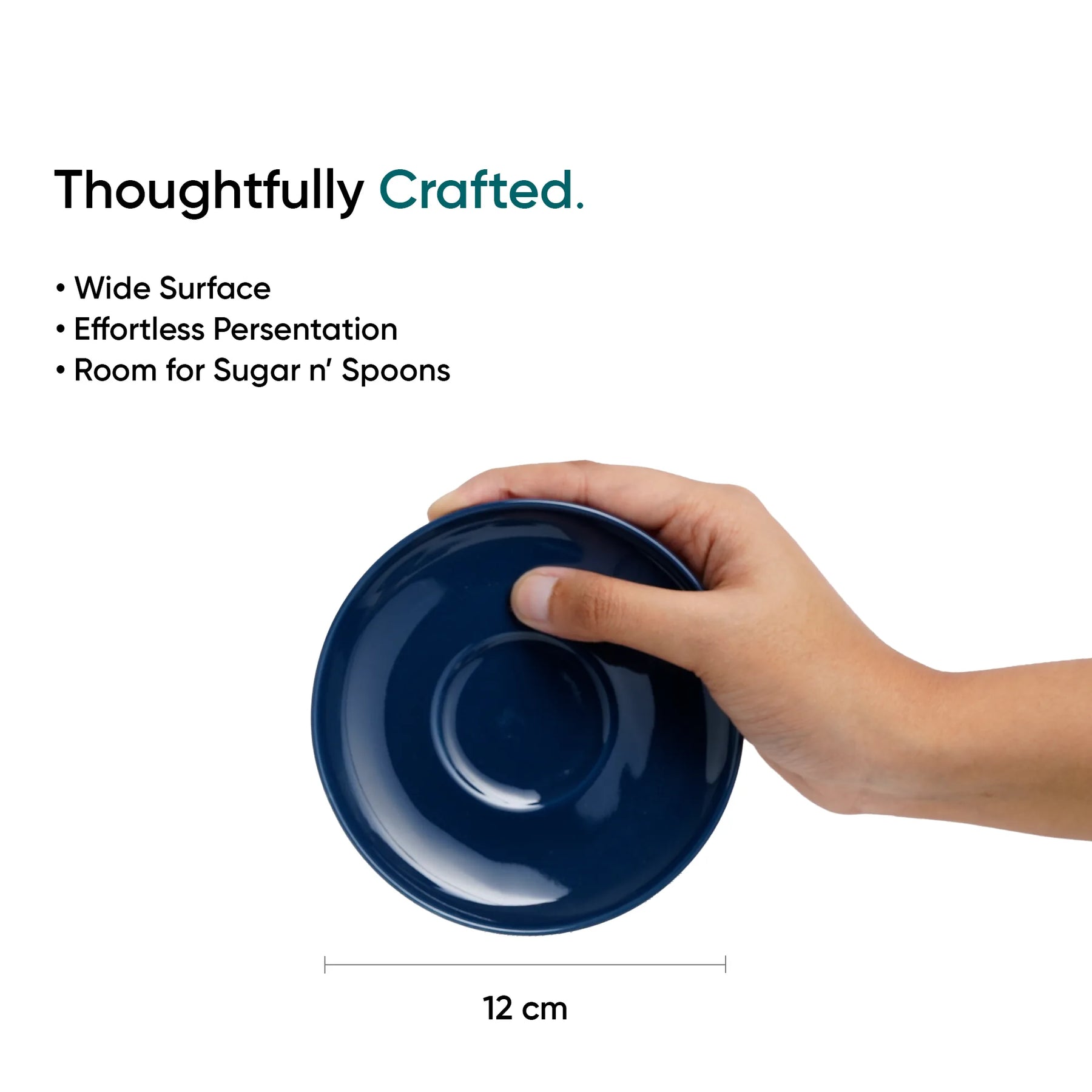 Hand holding a blue ceramic dish with text about its features on a white background