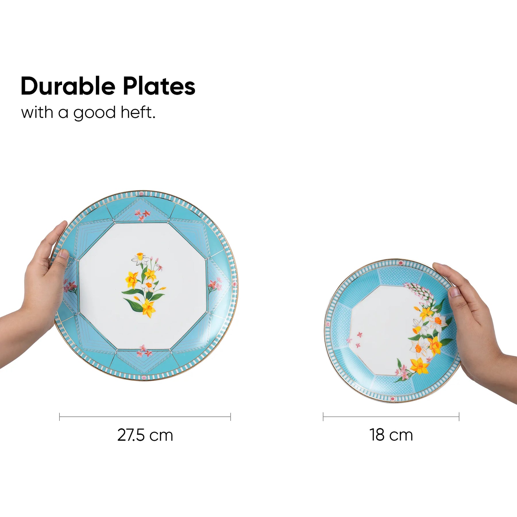 Two hands holding decorative plates with floral designs, showing size comparison.