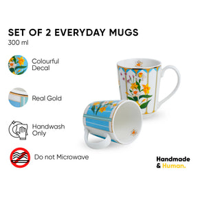 Set of 2 everyday mugs with floral design on a white background, featuring 'Handmade & Human' branding.