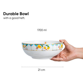 Hand holding a durable bowl with floral design, labeled '1700 ml' and '21 cm'.