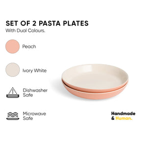 Set of 2 pasta plates with dual colors on a white background, featuring 'Handmade & Human' branding.