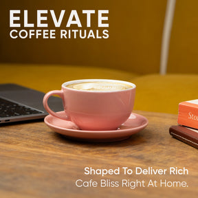 Pink coffee cup on a saucer with a blurred background and text about coffee rituals.