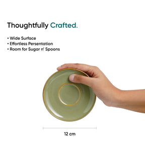 Hand holding a green ceramic dish with text about its features on a white background