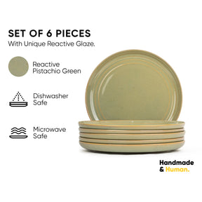 Set of 6 pistachio green ceramic plates with reactive glaze on a white background.