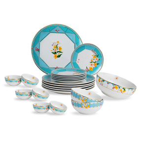 Ceramic dinnerware set with floral patterns on a white background