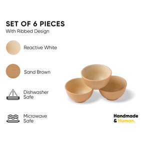 Set of 6 bowls with ribbed design in reactive white and sand brown on a white background, with branding 'Handmade & Human'.