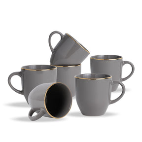 Set of gray mugs with gold rims on a white background