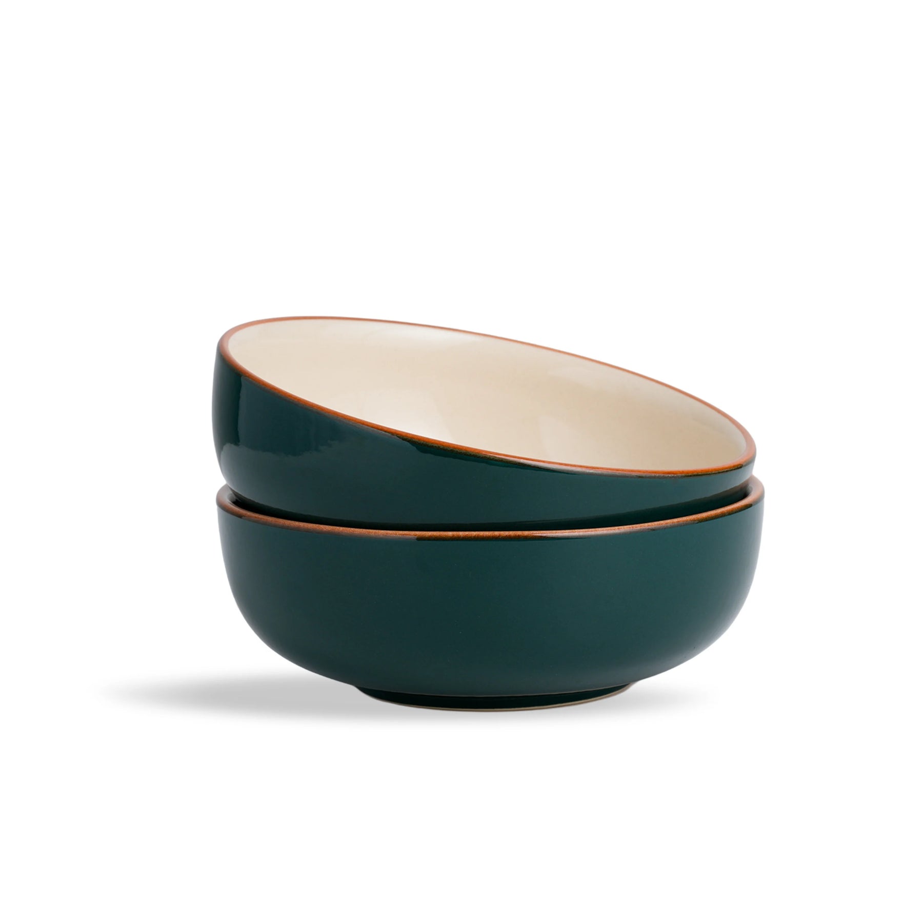 Two green ceramic bowls stacked on a white background