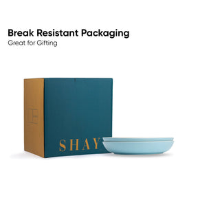 Blue bowl with 'SHAY' branding next to a teal box, emphasizing break-resistant packaging.