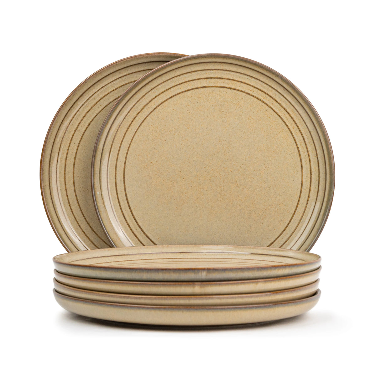 Set of beige ceramic plates with a subtle pattern on a white background