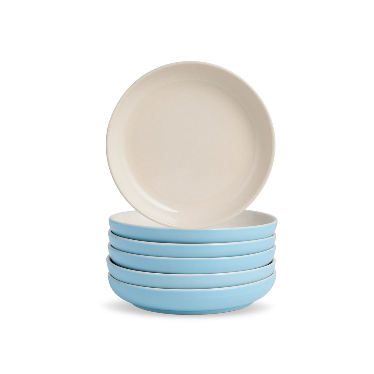 Set of four blue bowls with a beige bowl on top against a white background