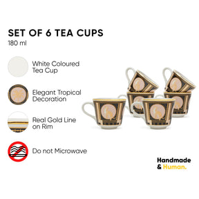 Set of 6 tea cups with tropical decoration, white interior, and gold rim on a white background.