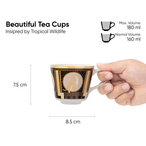 Tea cup held by a hand with dimensions and volume information on a white background