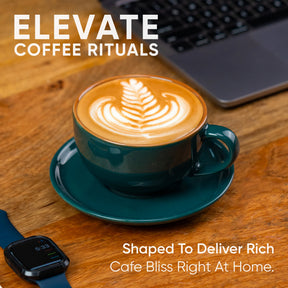 Cappuccino in a teal cup on a wooden table with text 'Elevate Coffee Rituals' and 'Shaped to deliver rich cafe bliss right at home'.