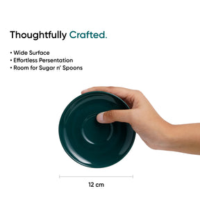 Hand holding a teal ceramic dish with product features listed on a white background