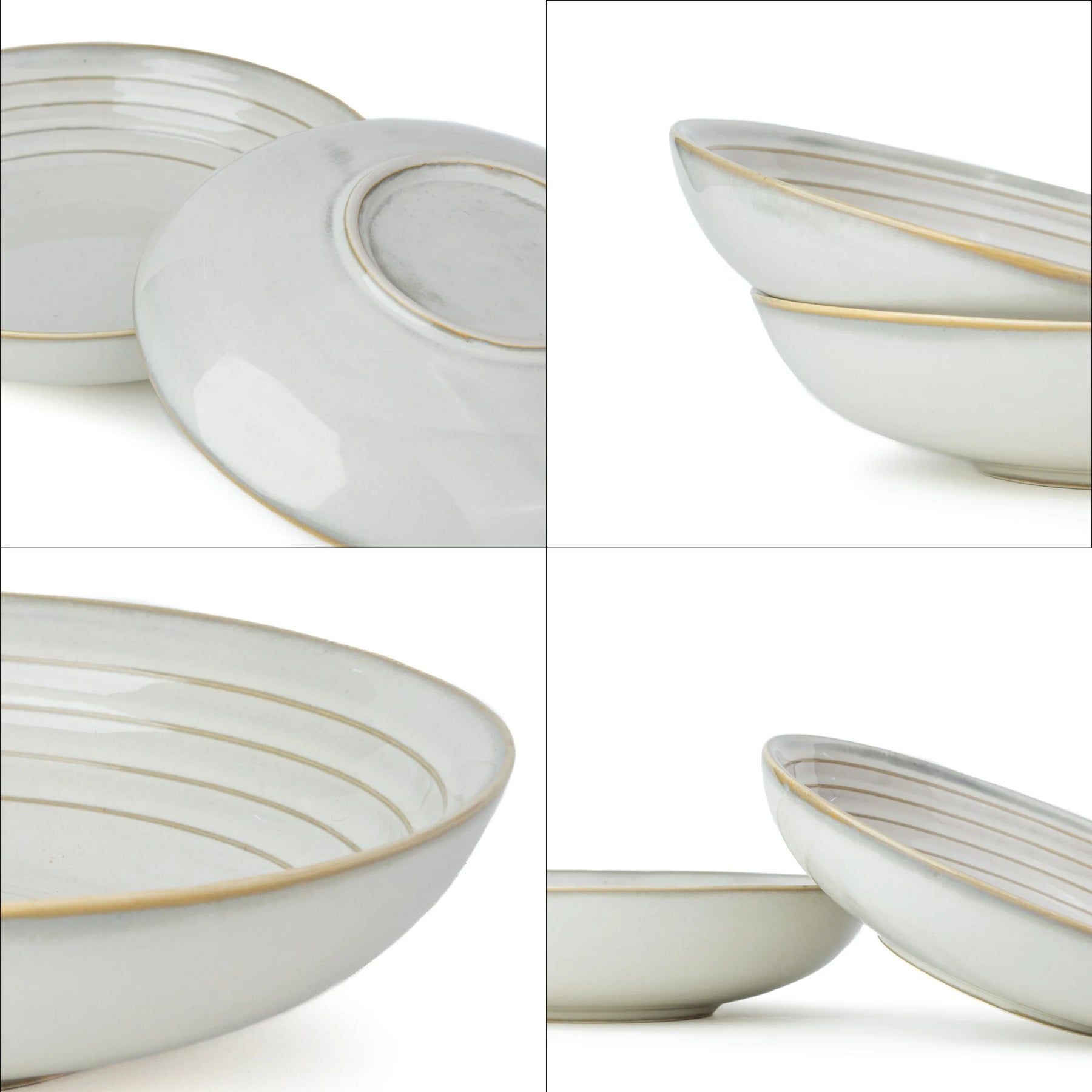 Set of white ceramic bowls with gold rims on a white background