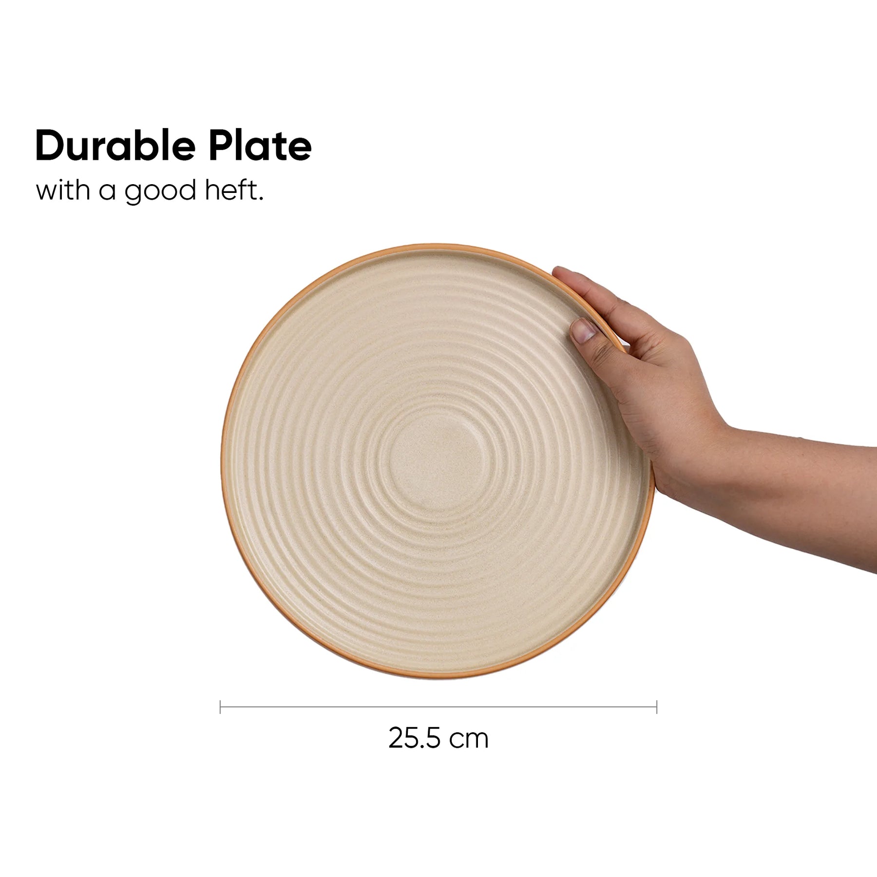 Beige ceramic plate held by a hand with text indicating durability and dimensions.