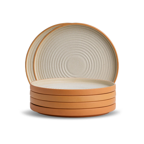 Set of ceramic bowls with brown rim and beige interior on a white background